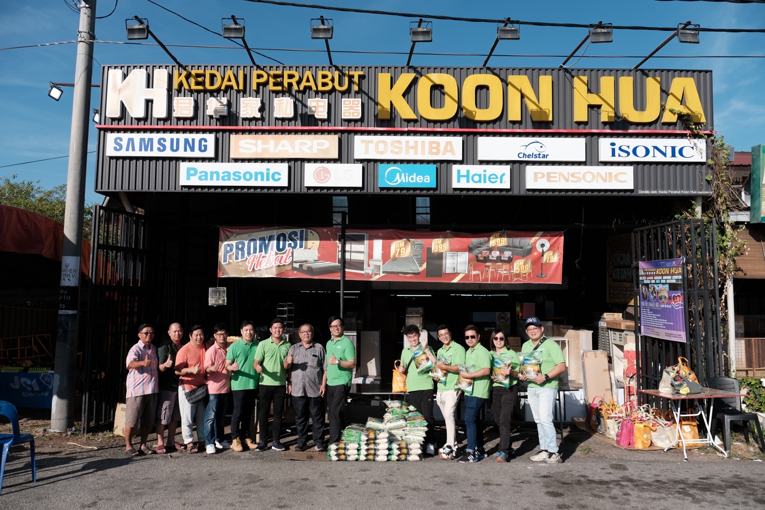 JCI Alor Setar members and supporters gathered with bags of essential supplies